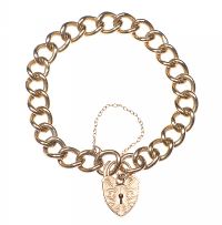 9 CT GOLD CURBLINK BRACELET WITH HEART SHAPED CATCH at Ross's Online Art Auctions
