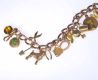 9CT GOLD BRACELET WITH GOLD CHARMS at Ross's Online Art Auctions