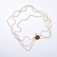TRIPLE STRING OF GRADUATED CULTURED PEARLS WITH A 9 CARAT GOLD ORANGE SAPPHIRE & SEED PEARL CLASP at Ross's Online Art Auctions