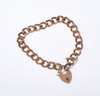 9 CARAT ROSE GOLD BRACELET WITH A 9 CARAT GOLD HEART SHAPED PADLOCK CATCH at Ross's Online Art Auctions