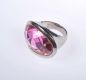 SILVER DRESS RING MOUNTED WITH A LARGE PINK CRYSTAL at Ross's Online Art Auctions