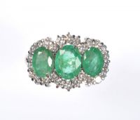 18 CARAT WHITE GOLD EMERALD & DIAMOND CLUSTER RING at Ross's Online Art Auctions