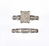 18 CARAT WHITE GOLD DIAMOND CLUSTER RING WITH AN 18 CARAT WHITE GOLD & DIAMOND ETERNITY RING at Ross's Online Art Auctions