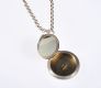 ENGRAVED CIRCULAR SILVER LOCKET ON A SILVER BELCHER CHAIN at Ross's Online Art Auctions