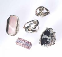 FOUR STERLING SILVER RINGS at Ross's Online Art Auctions