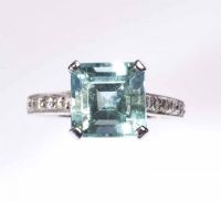 18CT WHITE GOLD & BLUE TOPAZ RING WITH DIAMOND CHIP SHOULDERS at Ross's Online Art Auctions