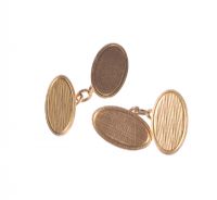 PAIR OF 9 CARAT ROSE GOLD OVAL CUFFLINKS at Ross's Online Art Auctions