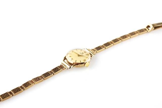 LADY'S 9CT GOLD OMEGA WRIST WATCH WITH 9CT GOLD BRACELET STRAP at Ross's Online Art Auctions