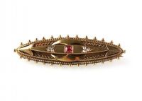 15CT GOLD EMBOSSED BAR BROOCH WITH RUBY CENTRE STONE & DIAMOND CHIPS at Ross's Online Art Auctions