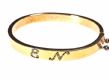 GOLD HOLLOW BANGLE WITH HEART FOB & ENGRAVED CIRCULAR FOB at Ross's Online Art Auctions