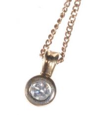 9CT GOLD AND DIAMOND SOLITAIRE PENDANT ON A 9CT GOLD CHAIN at Ross's Online Art Auctions
