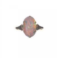 9 CARAT GOLD OVAL SHAPED OPAL RING at Ross's Online Art Auctions