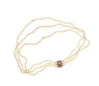 TRIPLE STRING OF GRADUATED PEARLS WITH 9 CARAT GOLD CLASP at Ross's Online Art Auctions