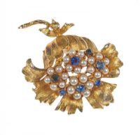 GILT METAL FLORAL SPRAY BROOCH MOUNTED WITH BLUE STONES & SIMULATED SEED PEARLS at Ross's Online Art Auctions