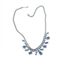 METAL ART DECO STYLE NECKLACE MOUNTED WITH BLUE STONES at Ross's Online Art Auctions