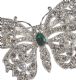 WHITE METAL ART DECO STYLE BUTTERFLY BROOCH MOUNTED WITH A GREEN STONE at Ross's Online Art Auctions