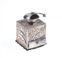 MINIATURE CONTINENTAL EMBOSSED NUTMEG GRINDER at Ross's Online Art Auctions