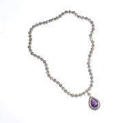 PEAR SHAPED SILVER AMETHYST PENDANT ON A SILVER & MARCASITE NECKLACE at Ross's Online Art Auctions