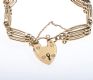 9 CT GOLD GATE LINK BRACELET WITH HEART SHAPED PADLOCK CATCH at Ross's Online Art Auctions