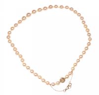 GRADUATED STRING OF CULTURED PEARLS WITH A GOLD BALL CLASP at Ross's Online Art Auctions