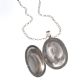 OVAL SILVER ENGRAVED LOCKET ON A LONG SILVER ROLO LINK CHAIN at Ross's Online Art Auctions