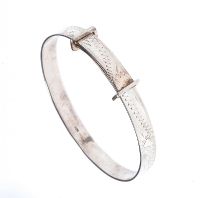 CHILD'S ENGRAVED SILVER BANGLE at Ross's Online Art Auctions