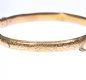 15 CT GOLD ENGRAVED BANGLE at Ross's Online Art Auctions