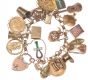 HEAVY 9 CT GOLD CHARM BRACELET WITH HEART SHAPED PADLOCK CATCH, TWO FULL SOVEREIGNS & A HALF SOVEREIGN at Ross's Online Art Auctions