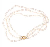 TRIPLE STRING OF FRESHWATER PEARLS WITH A SILVER GILT CLASP at Ross's Online Art Auctions