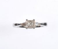 PLATINUM DIAMOND SOLITAIRE RING WITH DIAMOND SHOULDERS at Ross's Online Art Auctions