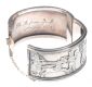 HEAVY SILVER VICTORIAN BANGLE WITH HIEROGLYPHICS IN RELIEF at Ross's Online Art Auctions