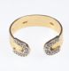 18 CT GOLD DIAMOND TORQUE RING at Ross's Online Art Auctions