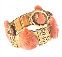 HEAVY 18 CT GOLD BRACELET WITH CARVED CORAL PANELS at Ross's Online Art Auctions