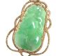 CARVED JADE PENDANT IN AN 18 CT GOLD MOUNT at Ross's Online Art Auctions
