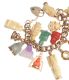 VICTORIAN 9 CT GOLD CHARM BRACELET WITH HEART SHAPED PADLOCK CATCH & SIXTEEN IVORY, CORAL, JADE & GOLD CHARMS at Ross's Online Art Auctions