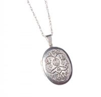 AN ENGRAVED SILVER LOCKET ON A FINE SILVER CHAIN at Ross's Online Art Auctions