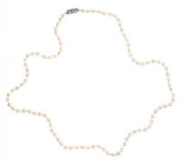 LONG STRING OF CULTURED PEARLS WITH A SILVER AND MARCASITE CLASP at Ross's Online Art Auctions