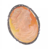 CARVED CAMEO SHELL IN A SILVER AND MARCASITE BROOCH at Ross's Online Art Auctions
