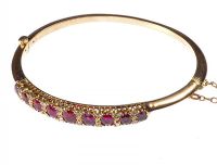 9 CT GOLD RUBY AND DIAMOND BANGLE at Ross's Online Art Auctions
