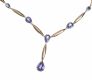 A SUITE OF 9CT GOLD AND TANZANITE NECKLACE, BRACELET AND EARRINGS at Ross's Online Art Auctions