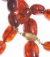 AMBER COLOURED RESIN BEAD NECKLACE WITH GOLD PLATED CLASP at Ross's Online Art Auctions