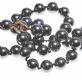 KNOTTED STRING OF HEMATITE BEADS WITH 9CT GOLD CLASP at Ross's Online Art Auctions