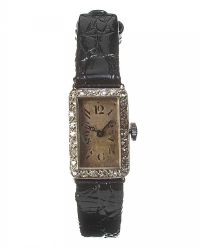 PLATINUM DIAMOND AND LEATHER LADY'S COCKTAIL WRIST WATCH at Ross's Online Art Auctions