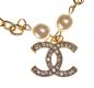 METAL AND FAUX PEARL CHARM BRACELET IN THE STYLE OF CHANEL at Ross's Online Art Auctions