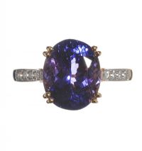 LORIQUE 18CT GOLD TANZANITE AND DIAMOND RING at Ross's Online Art Auctions