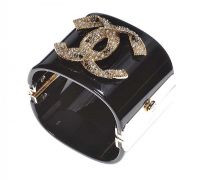 RESIN, GOLD-COLOURED METAL, FAUX PEARL AND CRYSTAL CUFF IN THE STYLE OF CHANEL at Ross's Online Art Auctions