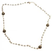 GOLD-COLOURED METAL FAUX PEARL AND KNITTED WOOL NECKLACE IN THE STYLE OF CHANEL at Ross's Online Art Auctions