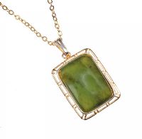 GOLD-COLOURED METAL AND JADE PENDANT AND CHAIN at Ross's Online Art Auctions