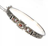 SILVER GARNET, ONYX AND MARCASITE BANGLE at Ross's Online Art Auctions