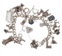 STERLING SILVER CHARM BRACELET WITH HEART-SHAPED PADLOCK CLASP at Ross's Online Art Auctions